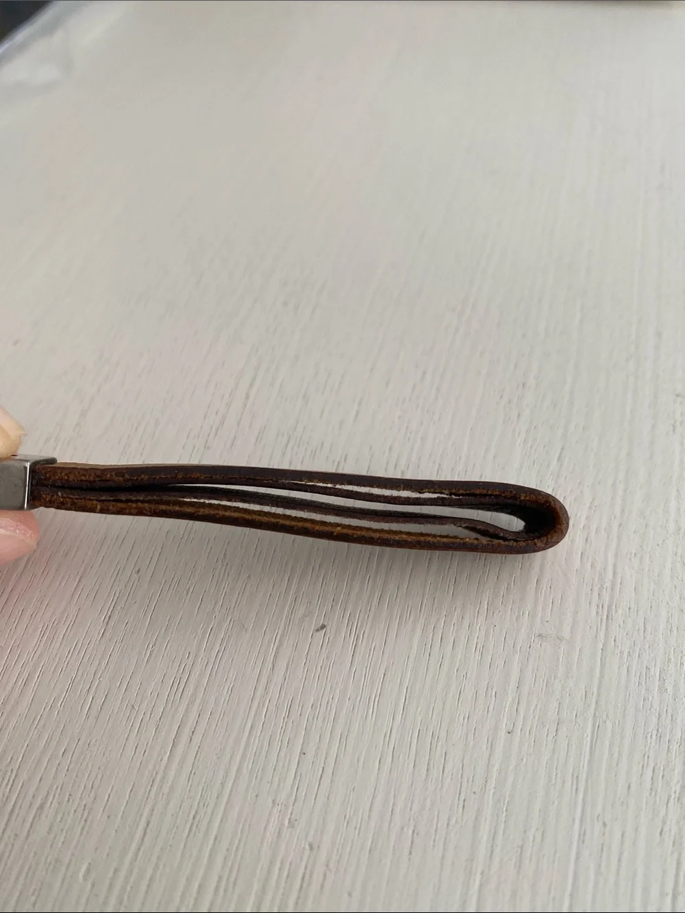 Coach leather strap keychain beige